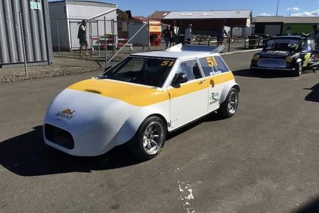 Brendan McKenzie's white and yellow number 51 Mini Sprint Mk 2 at Manfeild, February 2018
