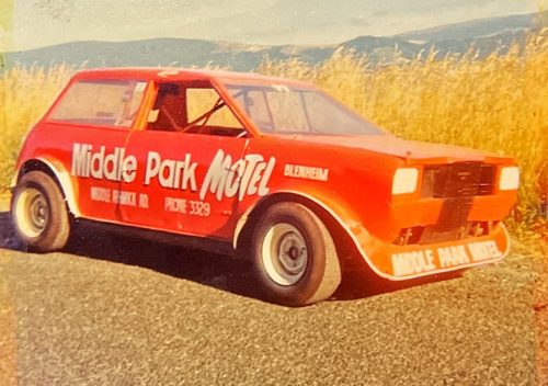 Lyn Hatton's red Mini Sprint in Middle Park Motel colours